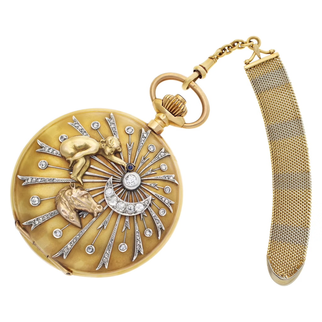 Gold hunter cover set with diamonds in a sunburst, with a cherub and a horse’s head in applied gold