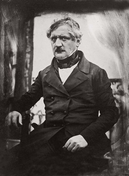 Photographic portrait of Fritz Courvoisier, seated