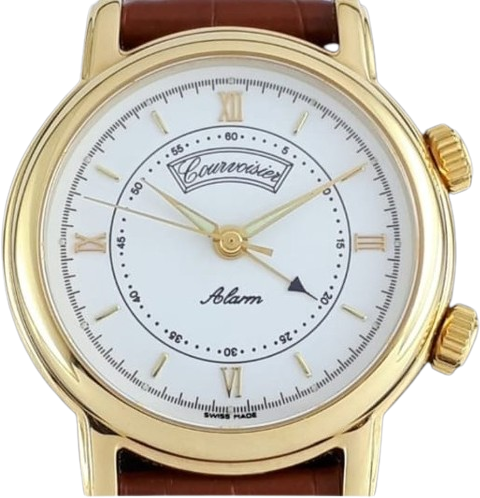 Gold alarm wristwatch of the 1990s with a white dial and Roman numerals, signed Courvoisier