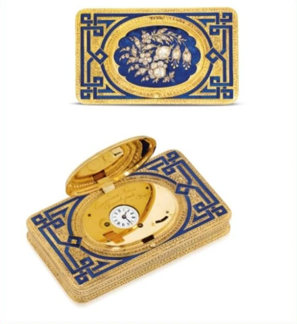 Gold, blue enamel and diamond-set snuff box by Courvoisier Frères, shown closed and open to reveal the concealed watch