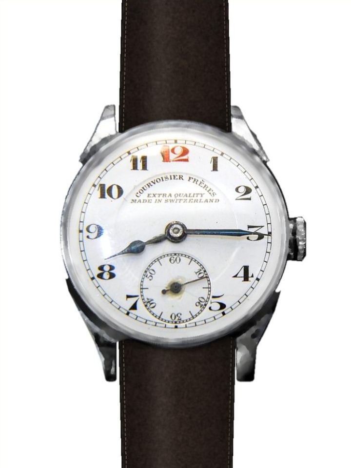 Courvoisier Frères wristwatch with a white dial, red twelve and small seconds, on a dark brown leather strap